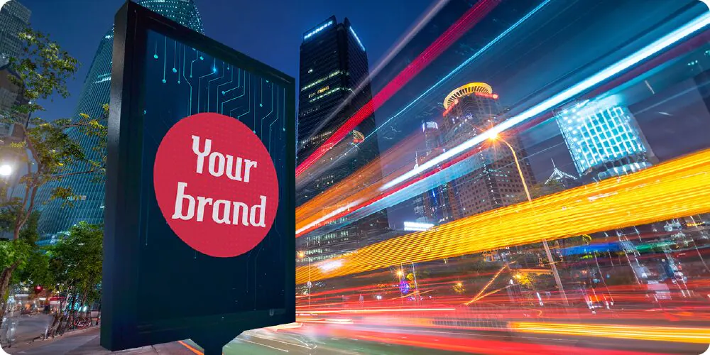 Painel de LED da marca em uma cidade iluminada à noite